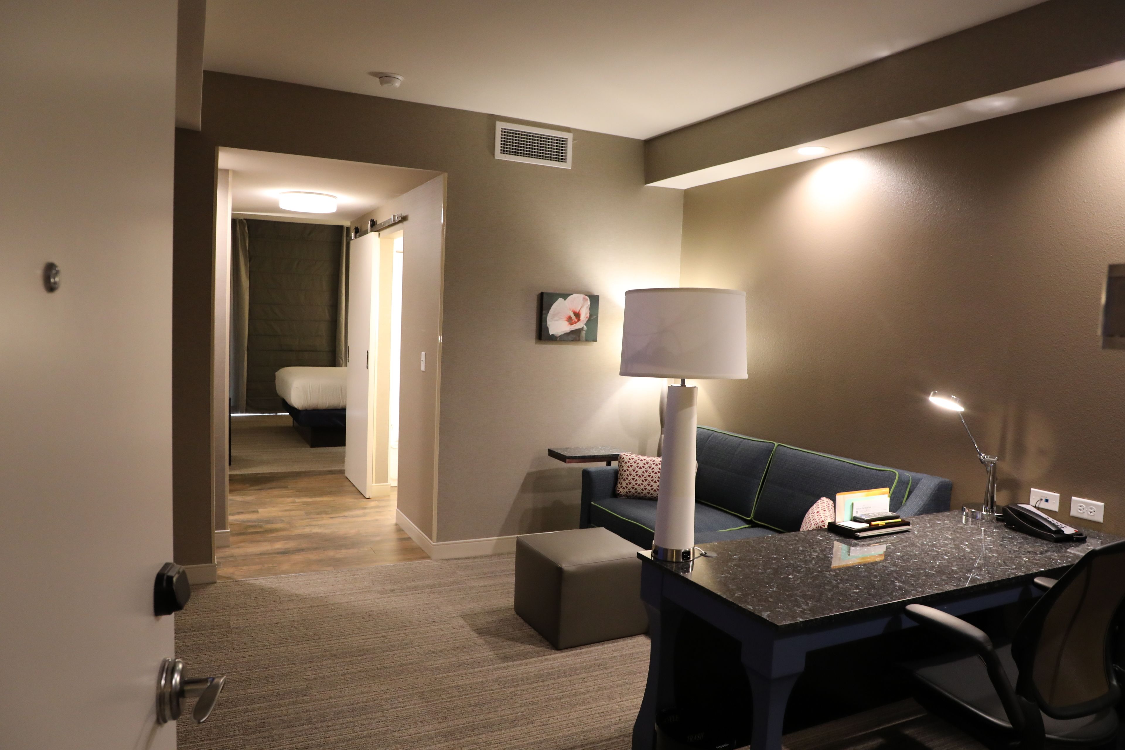 premium bedding, desk, blackout curtains, iron/ironing board