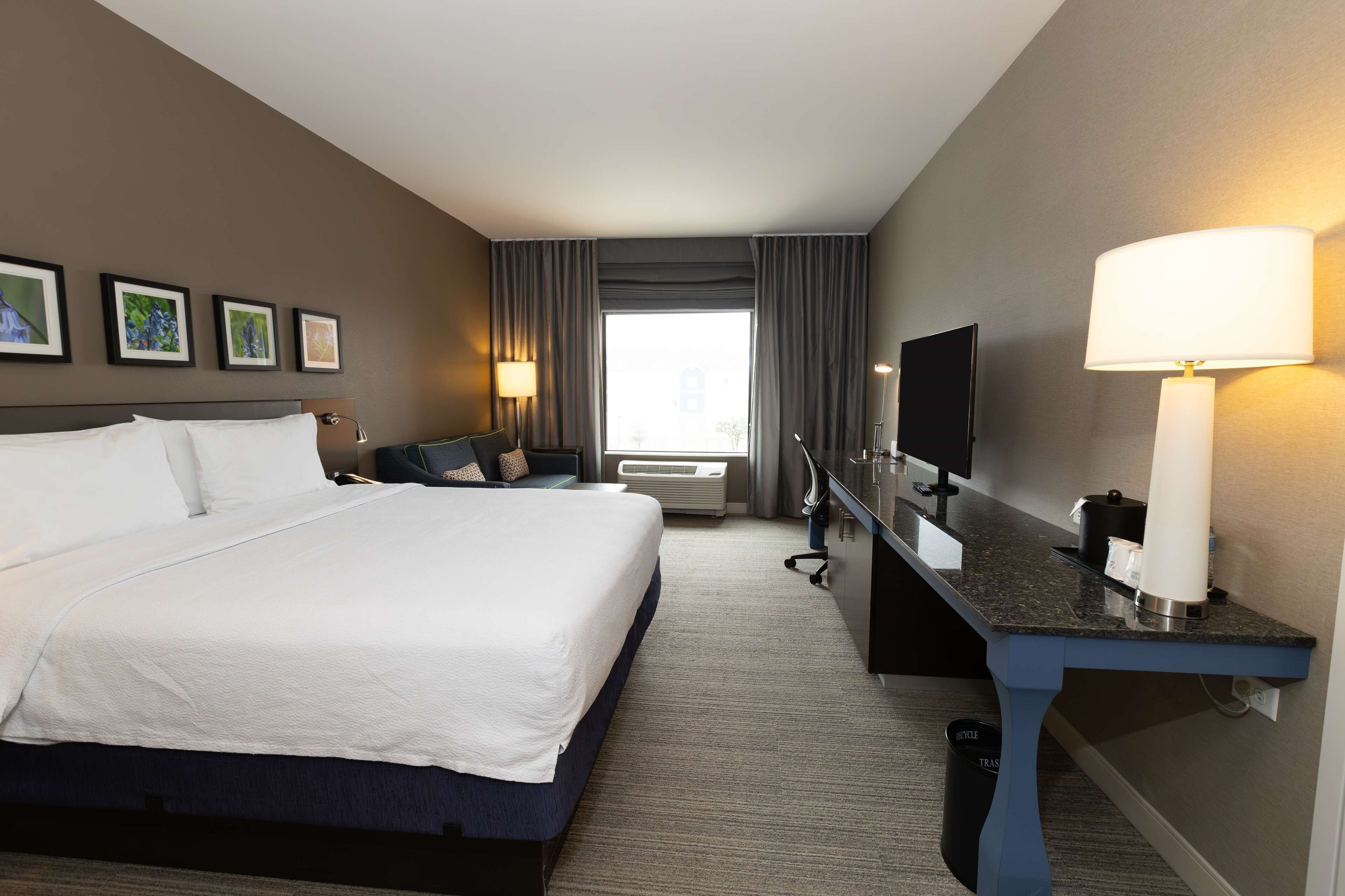 premium bedding, desk, blackout curtains, iron/ironing board