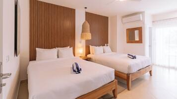 Deluxe 2 Queen with Balcony partial Ocean View | 1 bedroom, down comforters, in-room safe, free WiFi