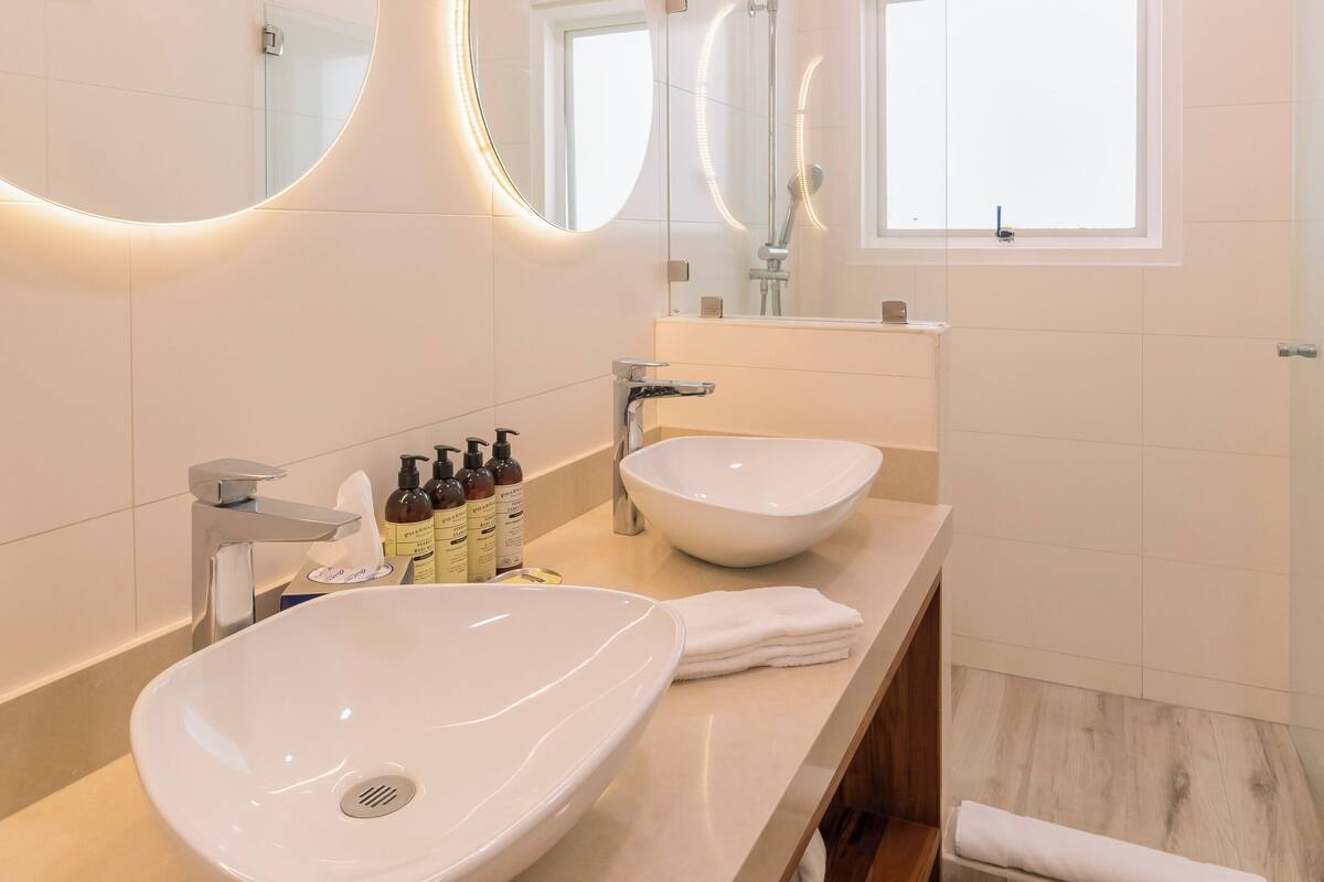 family 2 queen with balcony courtyard v | bathroom | shower, eco-friendly toiletries, hair dryer, towels