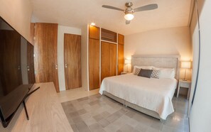 Deluxe Condo, 2 Bedrooms, Terrace, Partial Ocean View | 2 bedrooms, in-room safe, iron/ironing board, cribs/infant beds - Amazing Ocean View 2BR condo in wonderful location of PDC (Playa del Carmen)