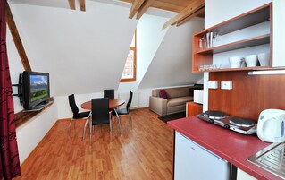 Suíte estúdio família, cozinha americana | Vista do quarto