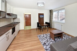 Apartamento família, 1 quarto, cozinha americana | Vista do quarto