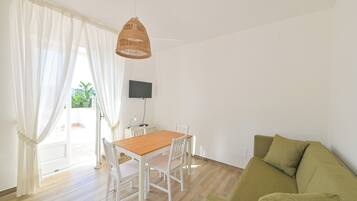 Apartment, 1 Bedroom, Terrace, Sea View | Living area | TV