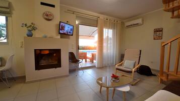 Family Duplex | Living area | Flat-screen TV, fireplace