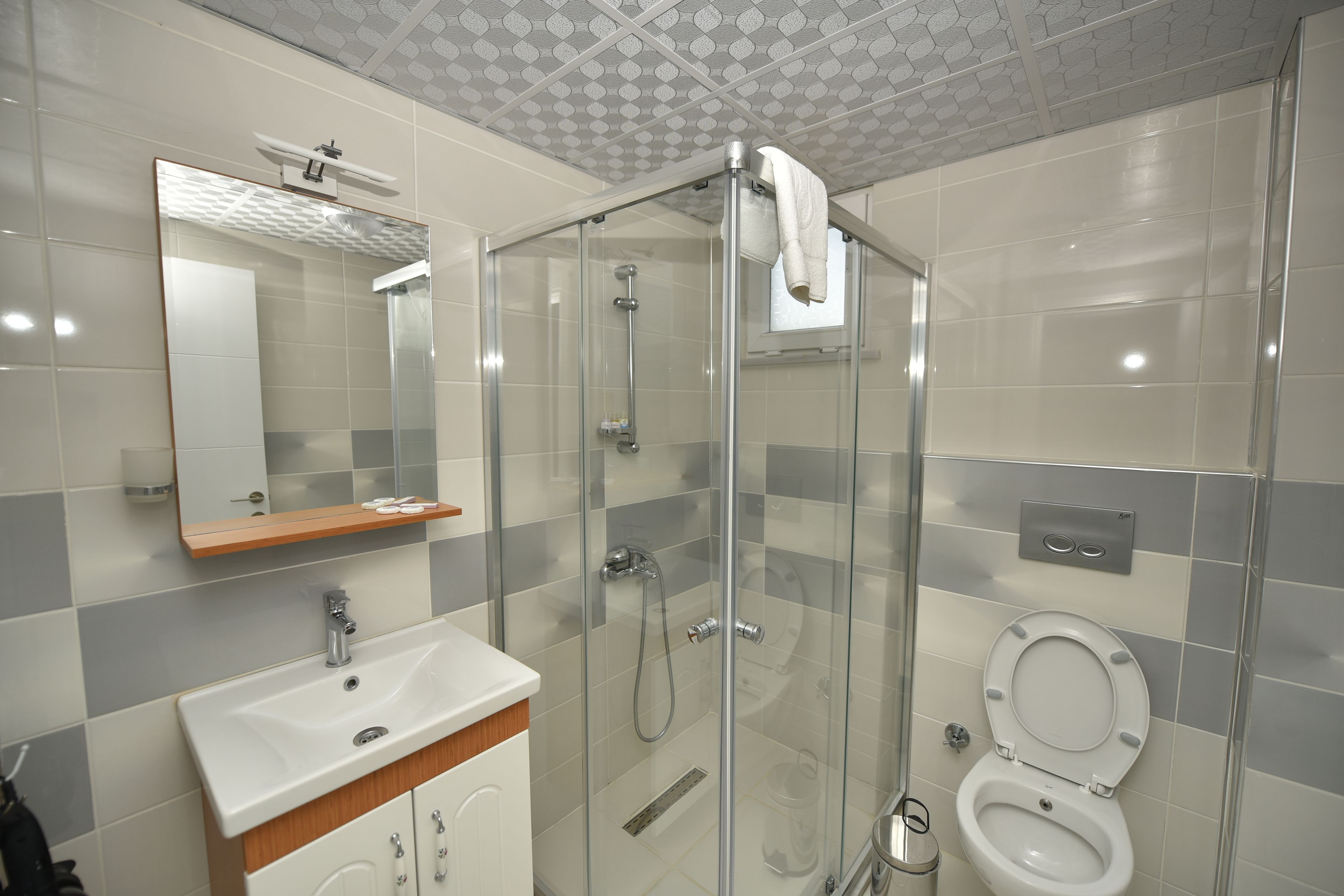 shower, free toiletries, hair dryer, slippers