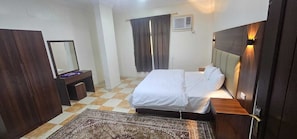 Apartment, 2 Bedrooms | Blackout drapes, free WiFi