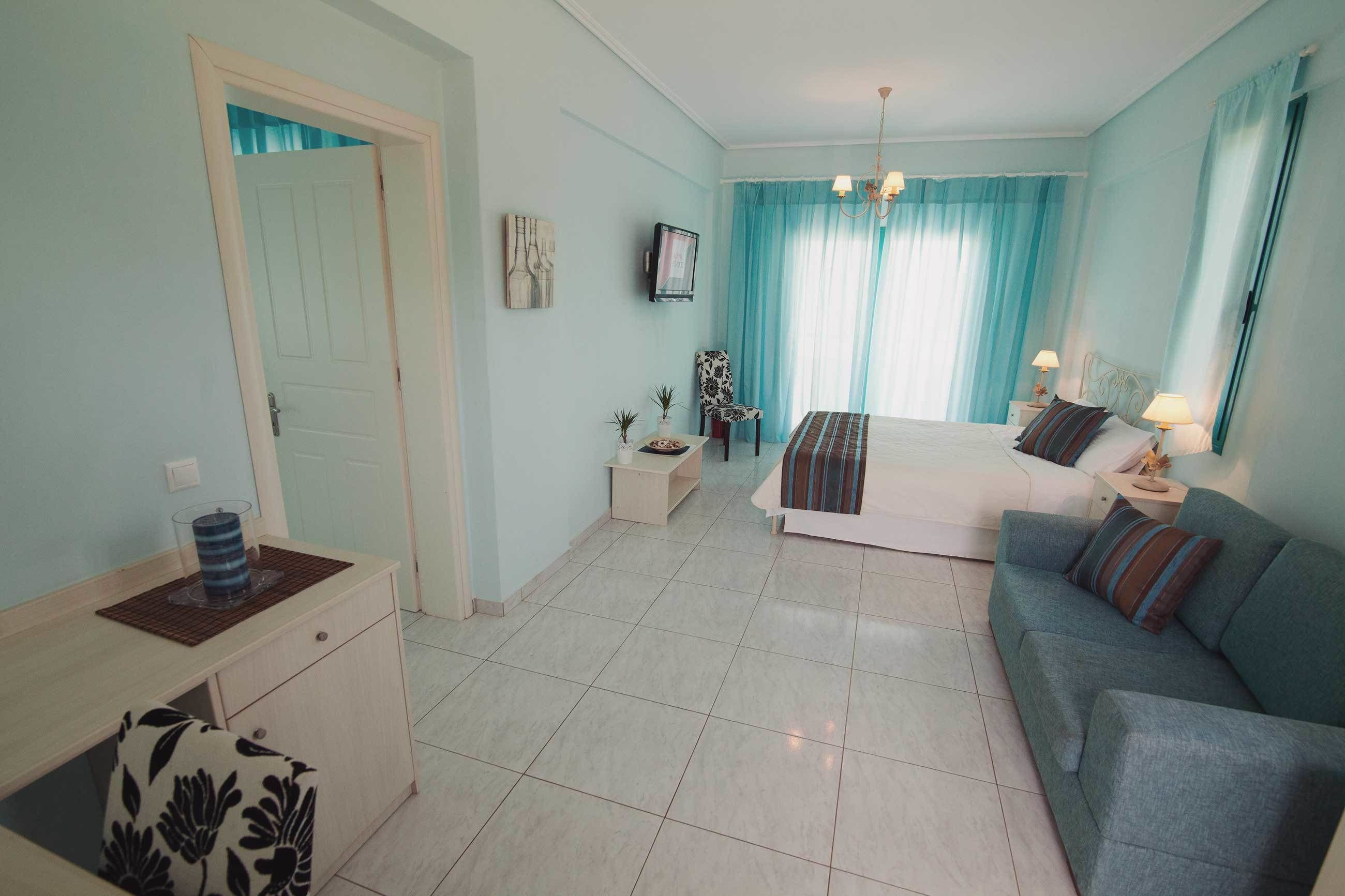 family room, sea view | premium bedding, in-room safe, desk, soundproofing