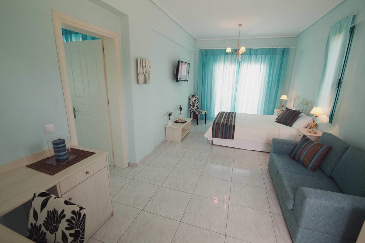 family room, sea view | premium bedding, in-room safe, desk, soundproofing