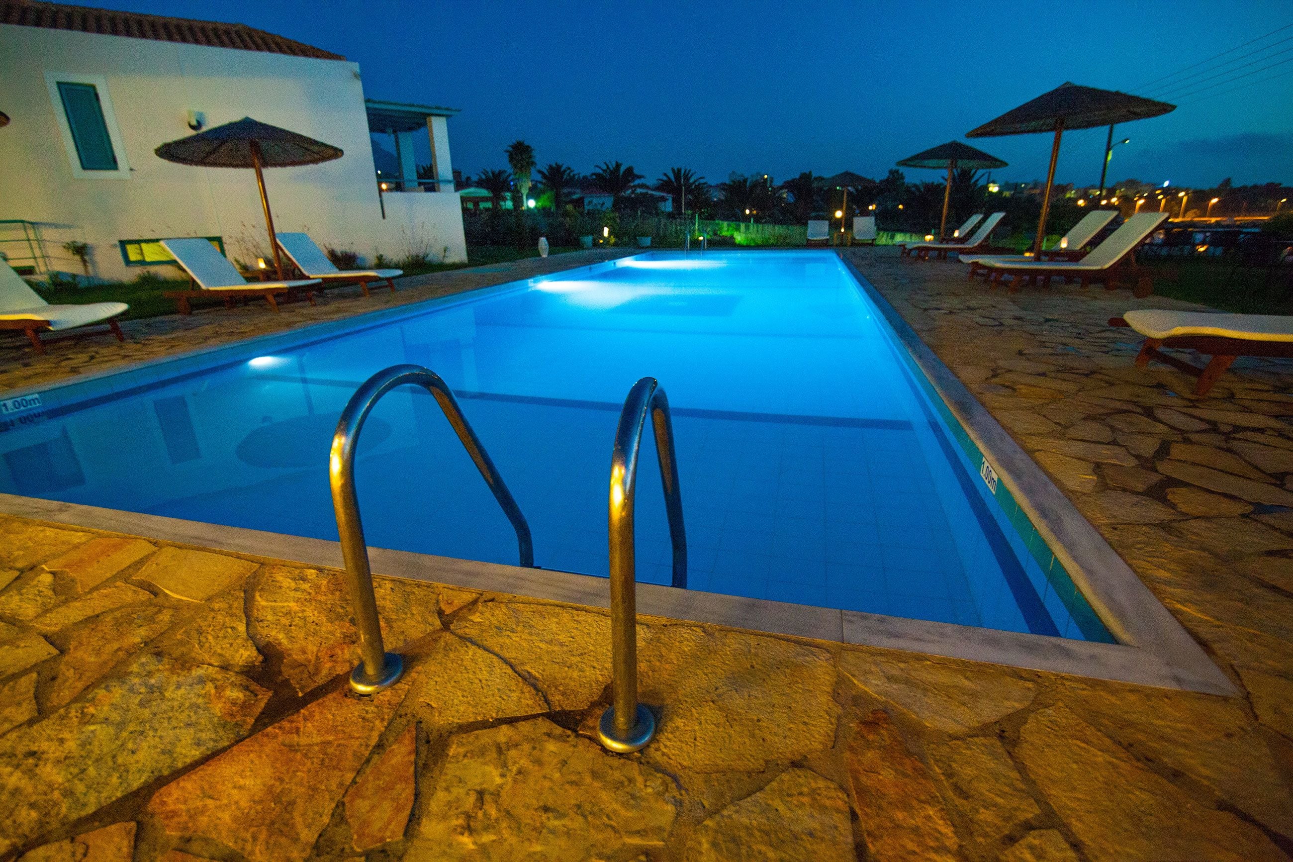 Seasonal outdoor pool, pool umbrellas, sun loungers