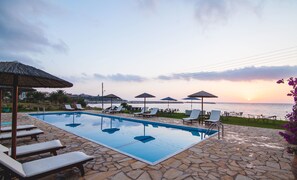 Seasonal outdoor pool, pool umbrellas, sun loungers
