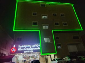 Front of property - evening/night - Al Eairy Furnished Apartments Dammam 4 (Dammam)