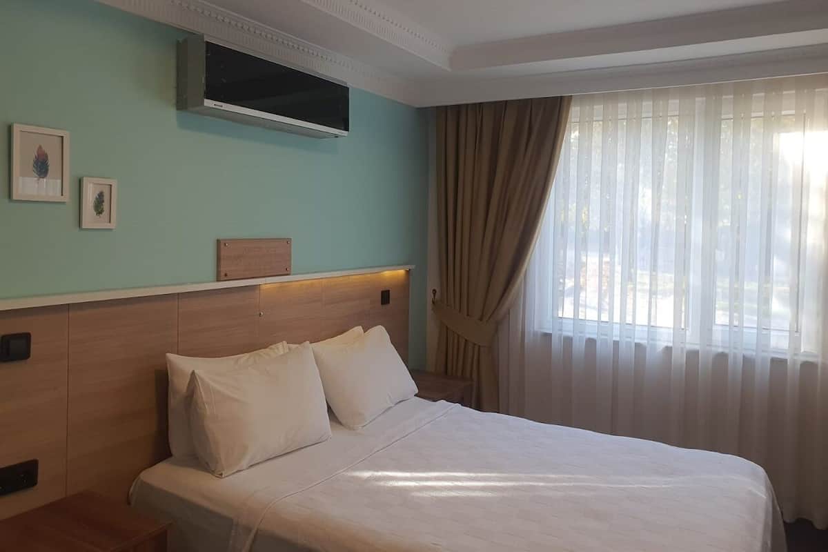 Economy kamer | 2 slaapkamers, luxe beddengoed, een minibar, individueel gedecoreerd