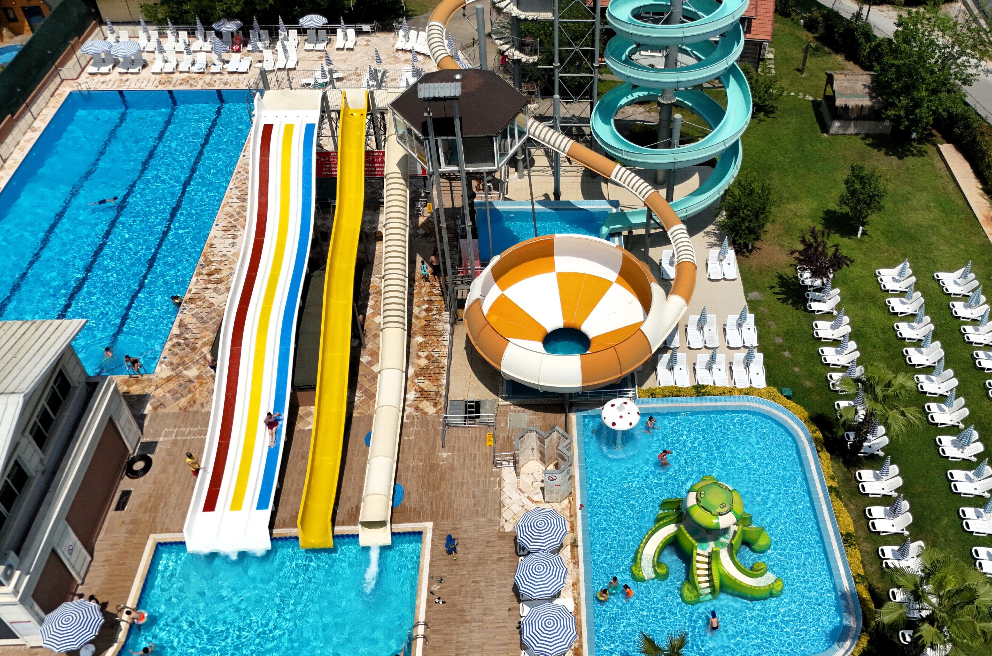 Indoor pool, seasonal outdoor pool, pool umbrellas, pool loungers