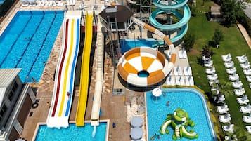Indoor pool, seasonal outdoor pool, pool umbrellas, pool loungers