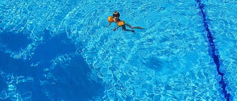 Indoor pool, seasonal outdoor pool, pool umbrellas, pool loungers
