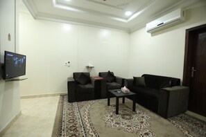 TV - Al Eairy Furnished Apartments Dammam 8 (Dammam)