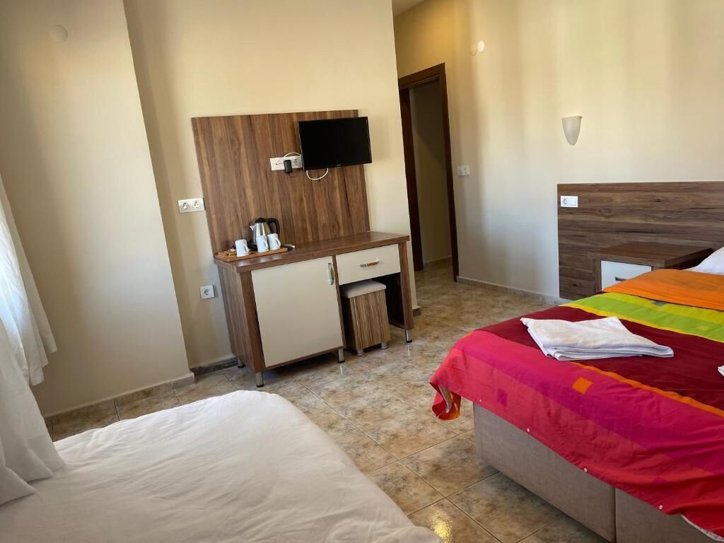 Family Suite, 2 Bedrooms, Connecting Rooms, Garden View | In-room safe, desk, iron/ironing board, free WiFi