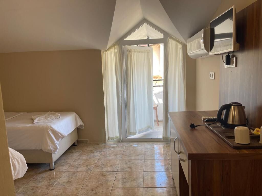 Family Suite, 2 Bedrooms, Connecting Rooms, Garden View | In-room safe, desk, iron/ironing board, free WiFi