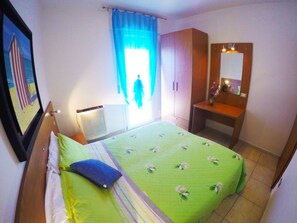 Apartment, 2 Bedrooms | 2 bedrooms, desk, cribs/infant beds - Appartamenti Levante (Caorle)