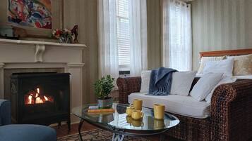 45-inch flat-screen TV with cable channels, TV, fireplace