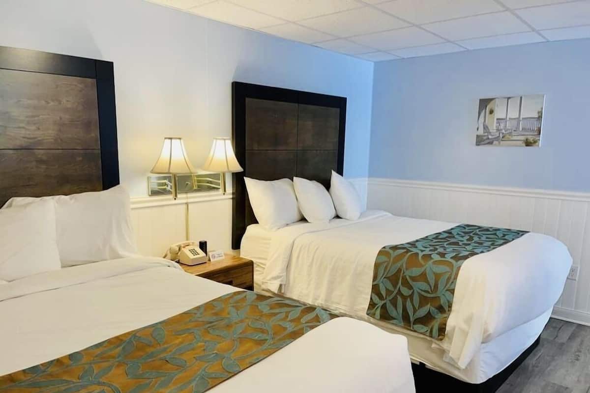 Basic Room, 2 Queen Beds | Desk, WiFi (free), individually furnished, bed sheets