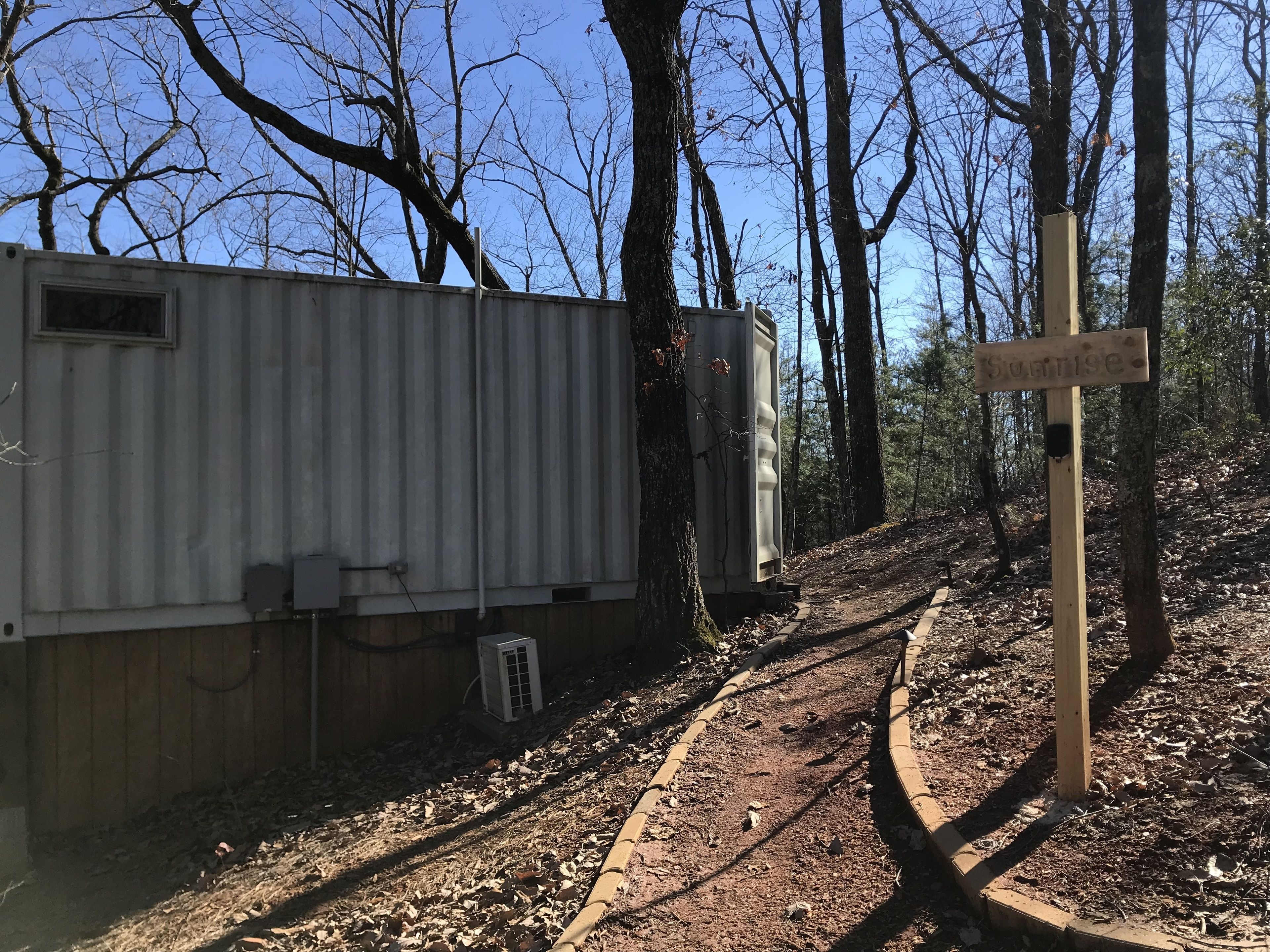 design cabin, 1 queen bed, refrigerator & microwave | individually decorated, individually furnished, iron/ironing board