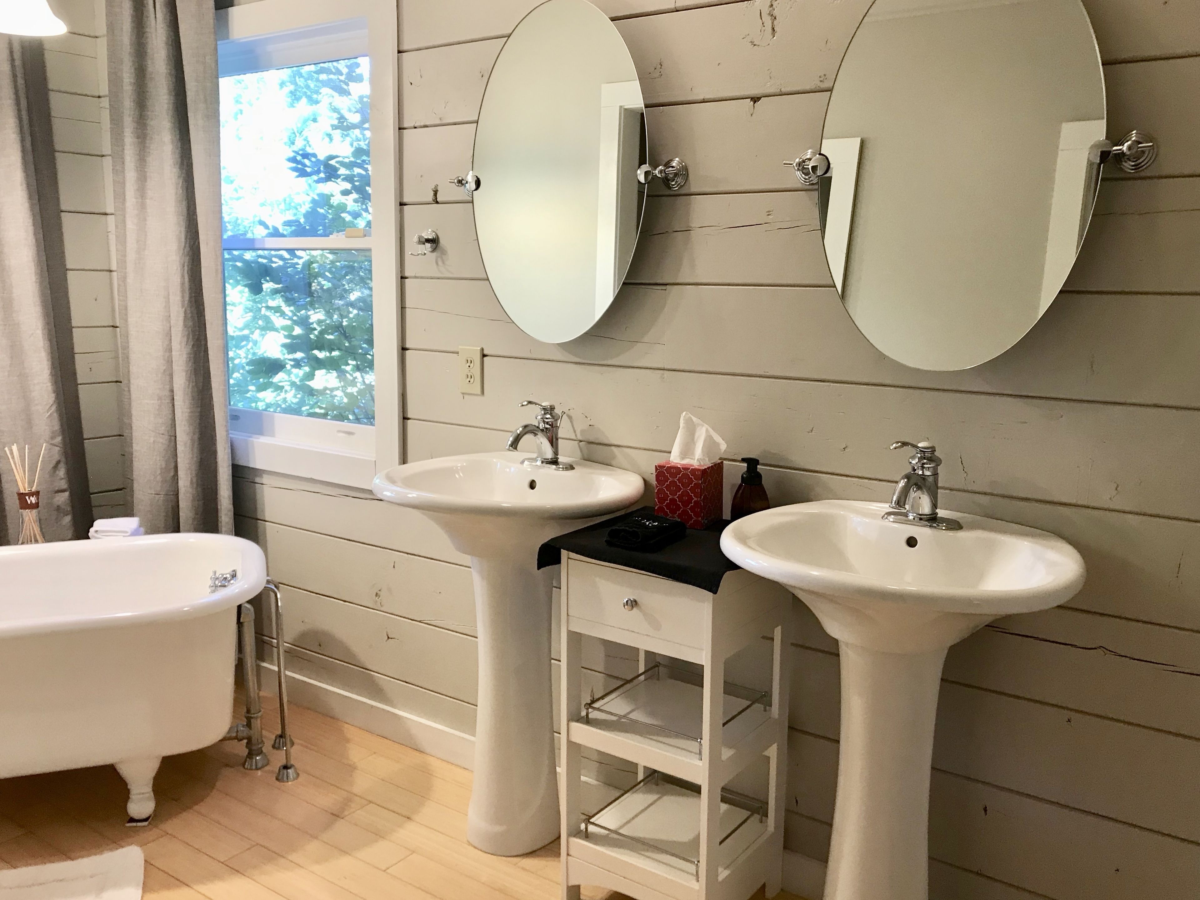 deluxe room, 2 queen beds, refrigerator & microwave | bathroom | free toiletries, hair dryer, towels, soap