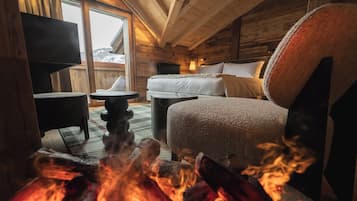 Suite Deluxe | Coffres-forts dans les chambres, bureau, fer et planche à repasser