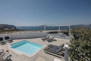 Outdoor pool, open 8:00 AM to 8:00 PM, sun loungers