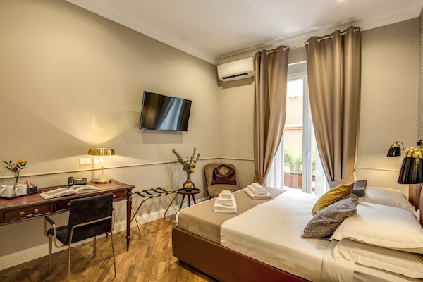 Luxe beddengoed, donsdekens, een minibar, een kluis op de kamer