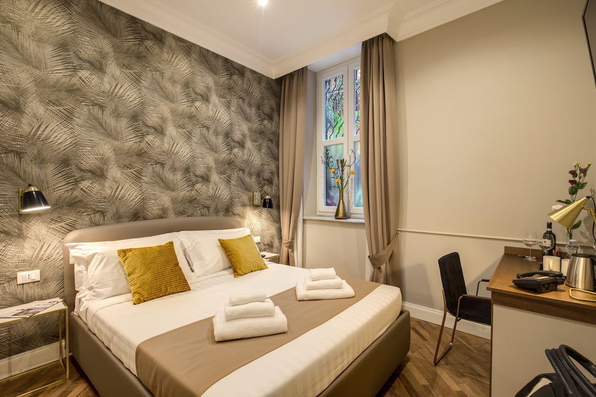 1 slaapkamer, luxe beddengoed, donzen dekbedden, een minibar