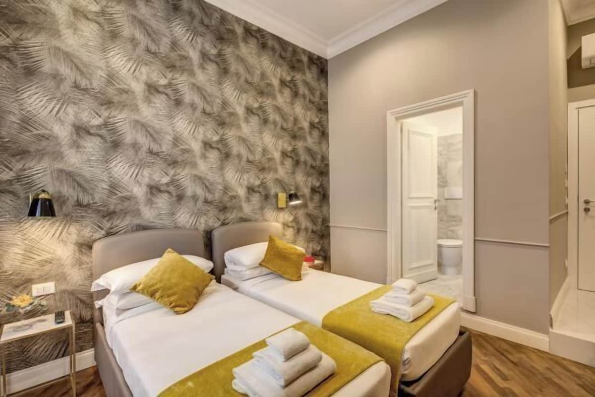 1 quarto, roupas de cama premium, edredons de pluma, frigobar