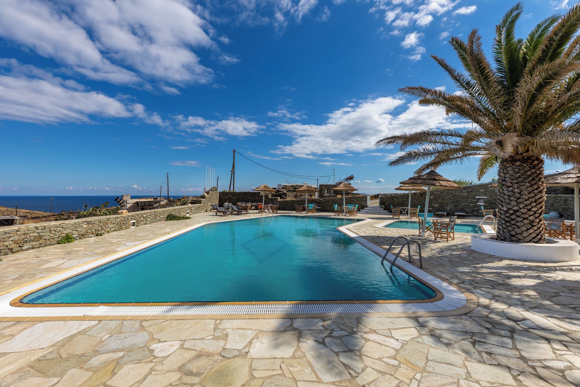 Outdoor pool, pool umbrellas, sun loungers