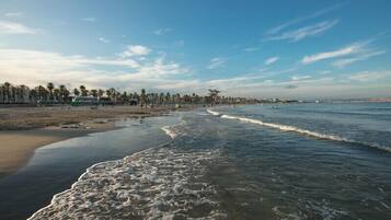 On the beach, white sand