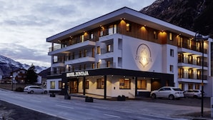 A multi-story hotel with a prominent sign reading "HOTEL ZONTAJA". - Hotel Zontaja (Galtur)