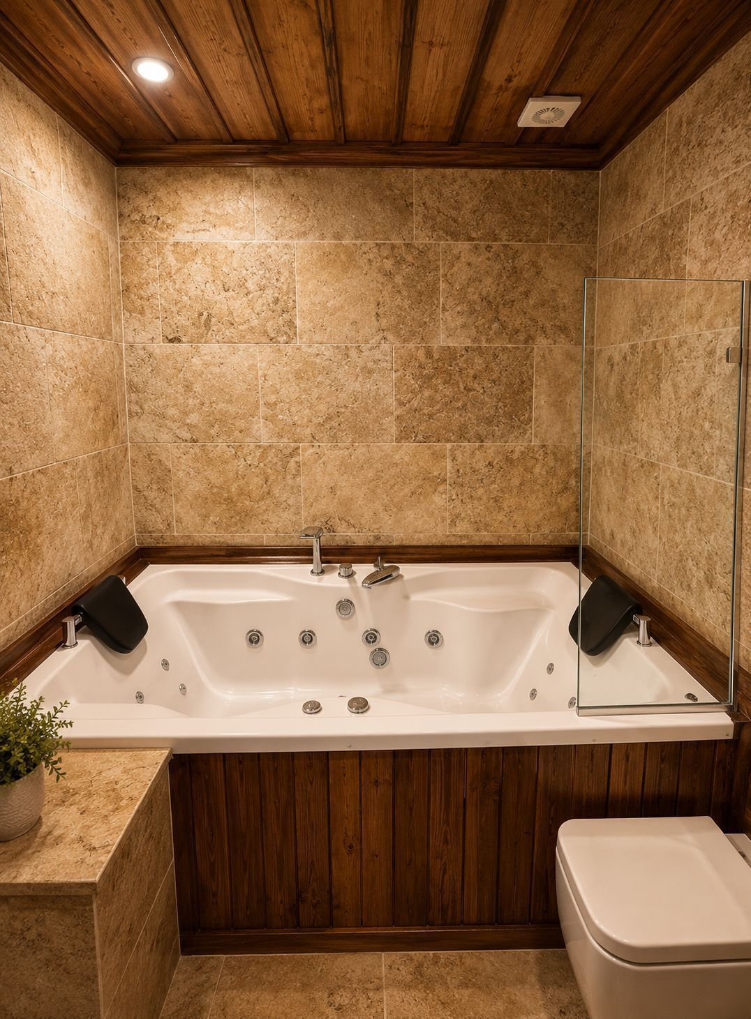 A bathroom with a freestanding bathtub, a toilet, and a shower area.