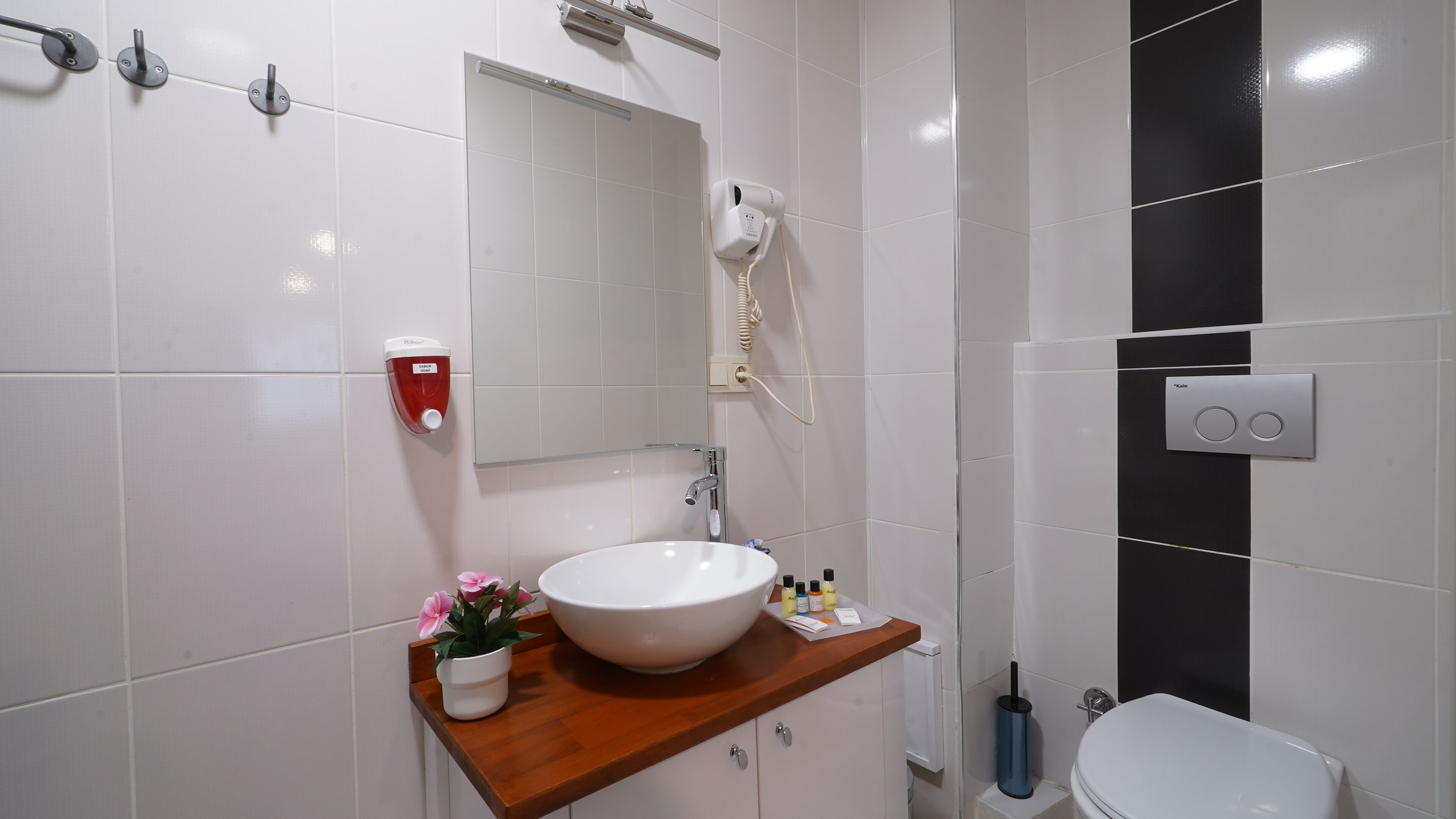 deluxe triple room | bathroom | shower, free toiletries, hair dryer, slippers