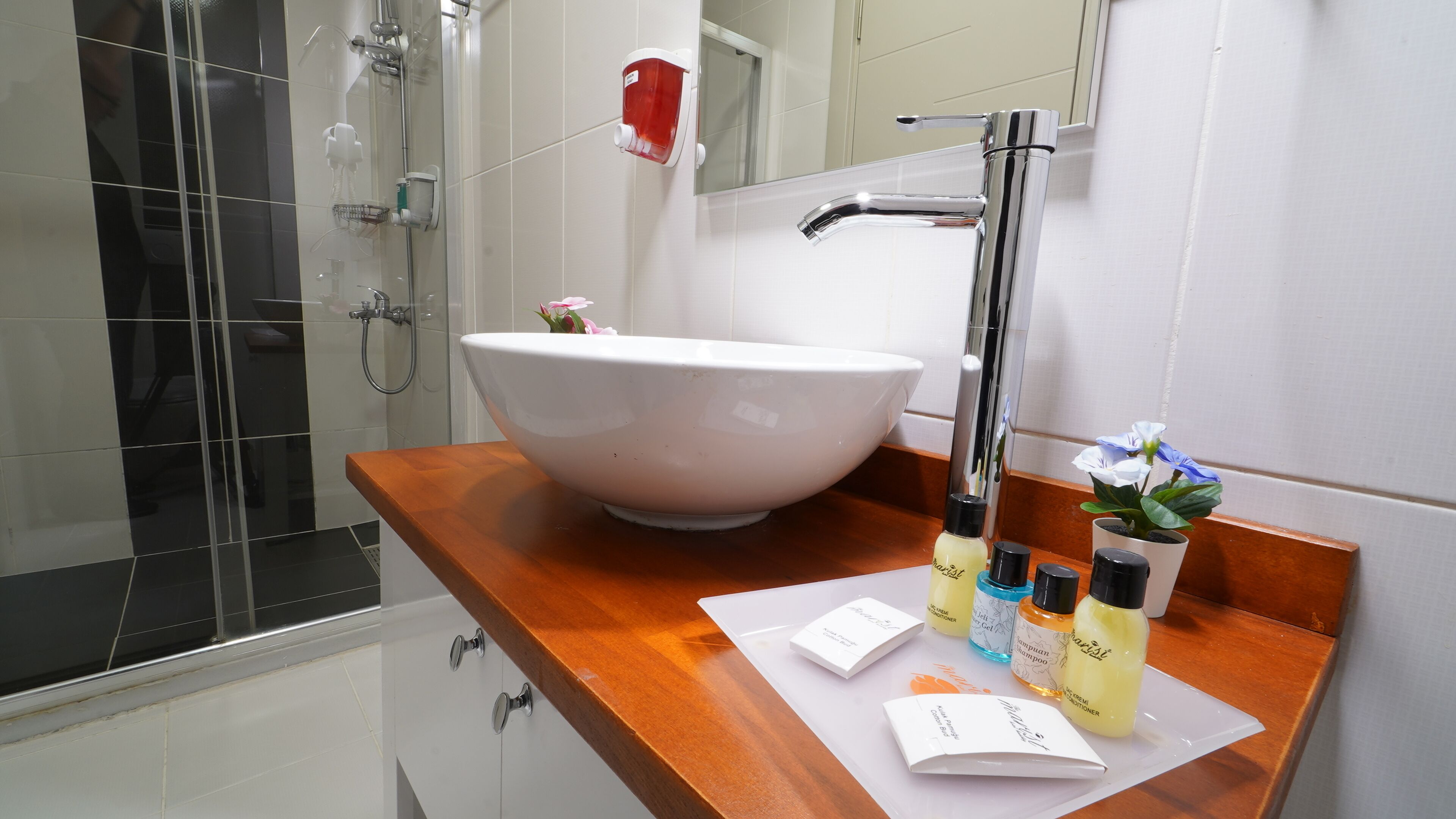 deluxe triple room | bathroom | shower, free toiletries, hair dryer, slippers