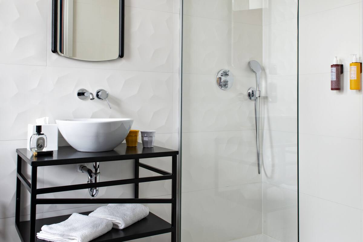 classic double or twin room (cool boma) | bathroom | free toiletries, hair dryer, towels