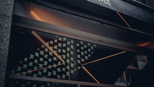 A building facade with a sign reading "BOMA" and a geometric pattern on the windows. - BOMA easy living hotel By Stay Collection (Strasbourg)