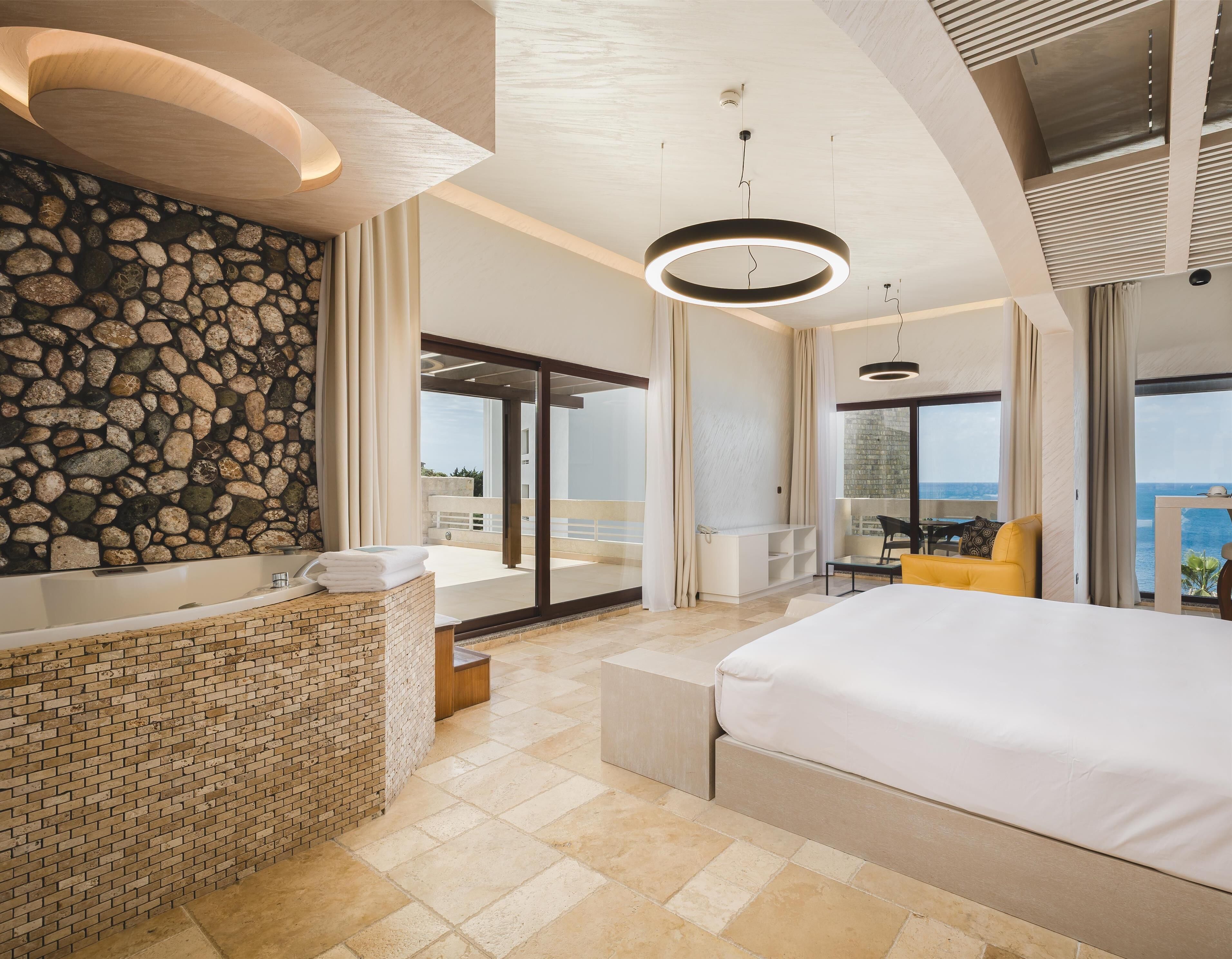 Suite, Hot Tub, Sea View | Minibar, in-room safe, desk, free WiFi