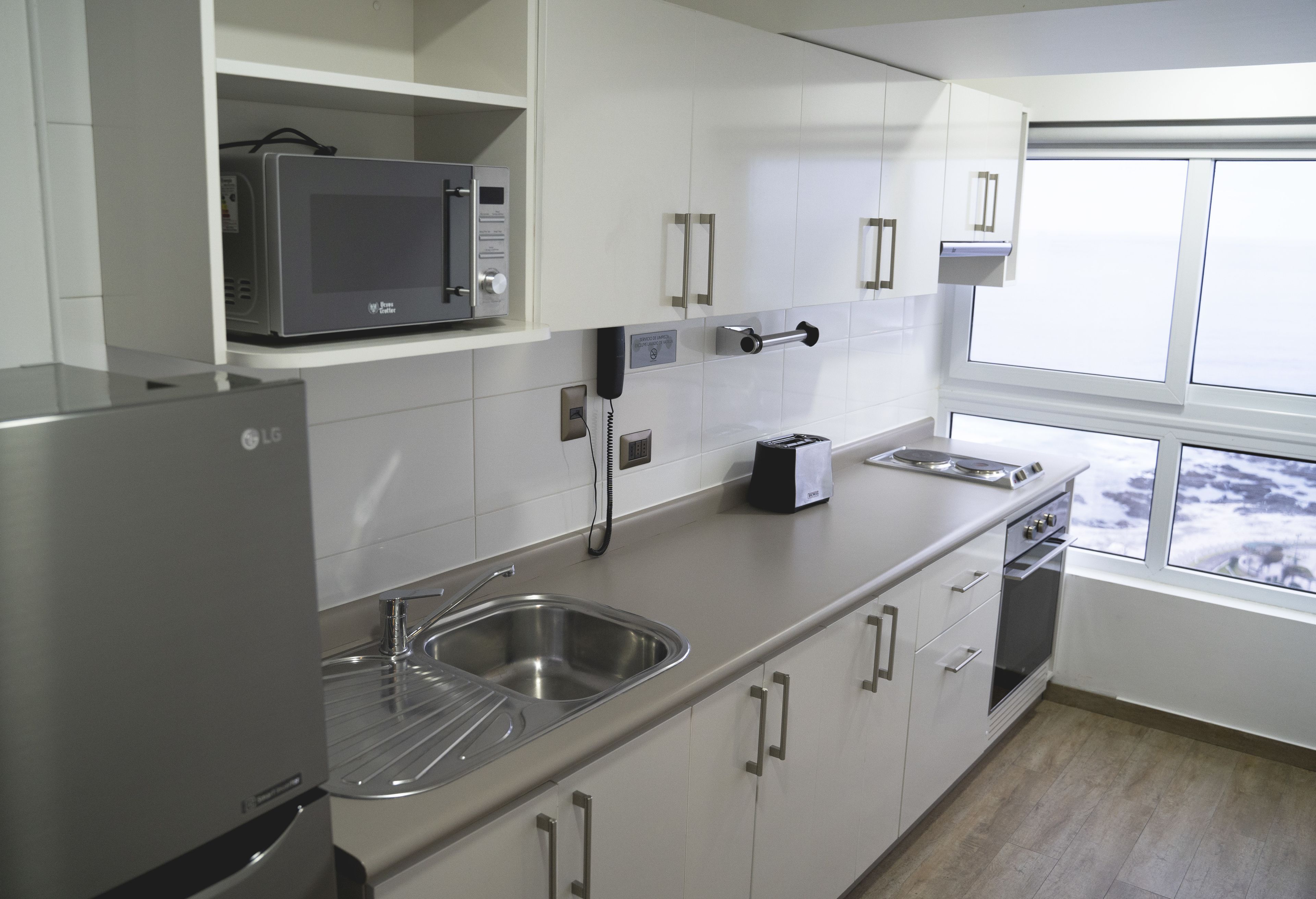 deluxe suite | private kitchen | fridge, microwave, cookware/dishes/utensils