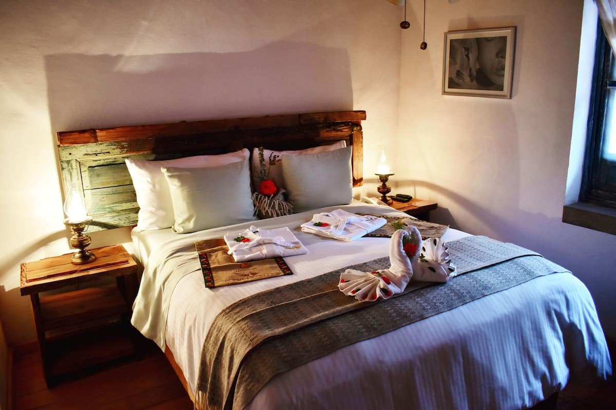 suite 1 king bed with sofa bed | in-room safe, individually furnished, desk, iron/ironing board