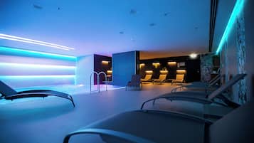 Indoor pool, seasonal outdoor pool, pool umbrellas, pool loungers