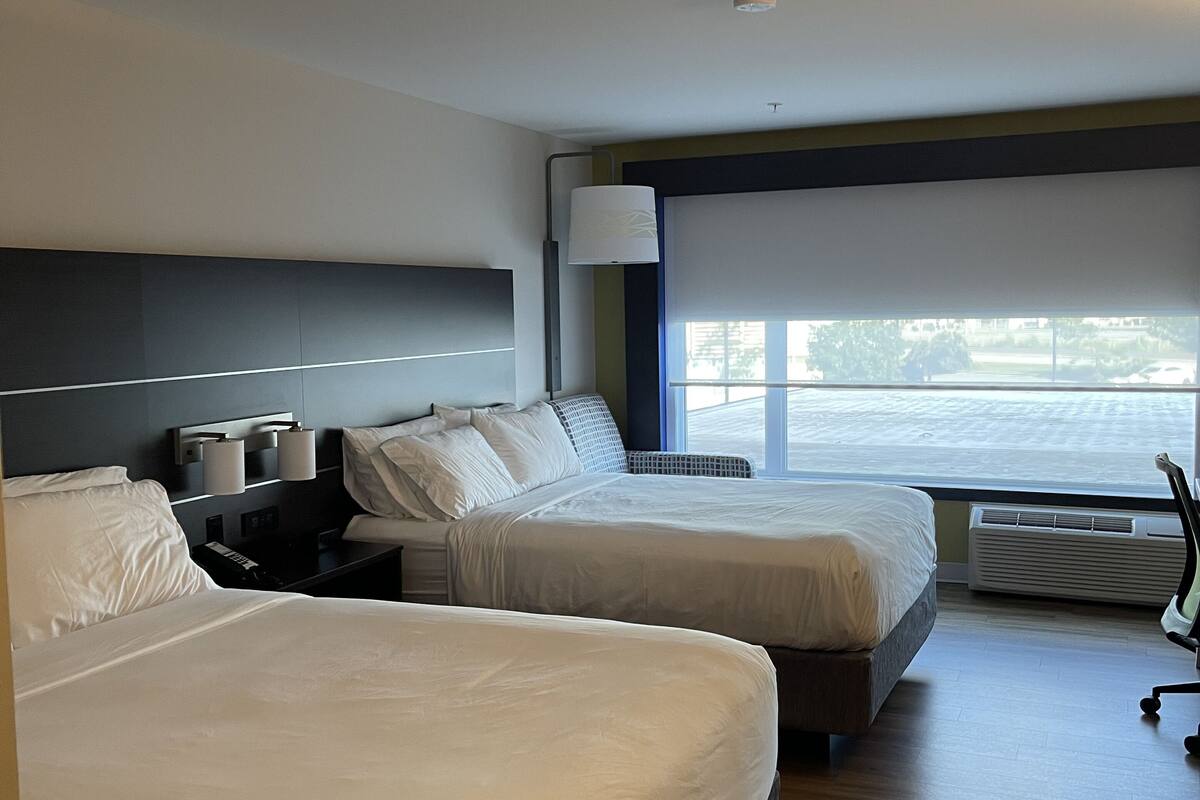 standard room, 2 queen beds | 1 bedroom, in-room safe, individually furnished, desk