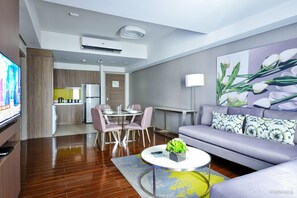 Deluxe Apartment, 2 Bedrooms, Non Smoking | Living room | 32-inch TV with cable channels - Citadines Millennium Ortigas Manila (Pasig)