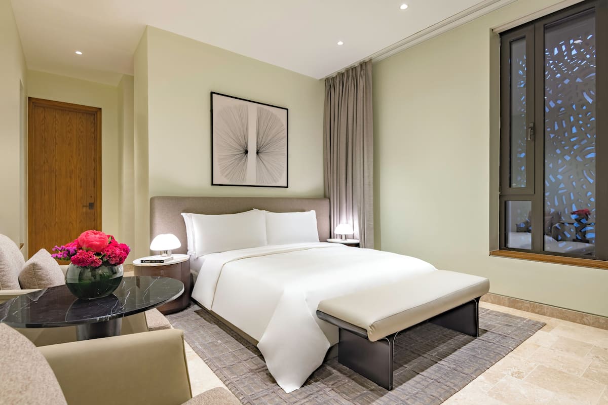 Premium bedding, down duvets, memory-foam beds, minibar