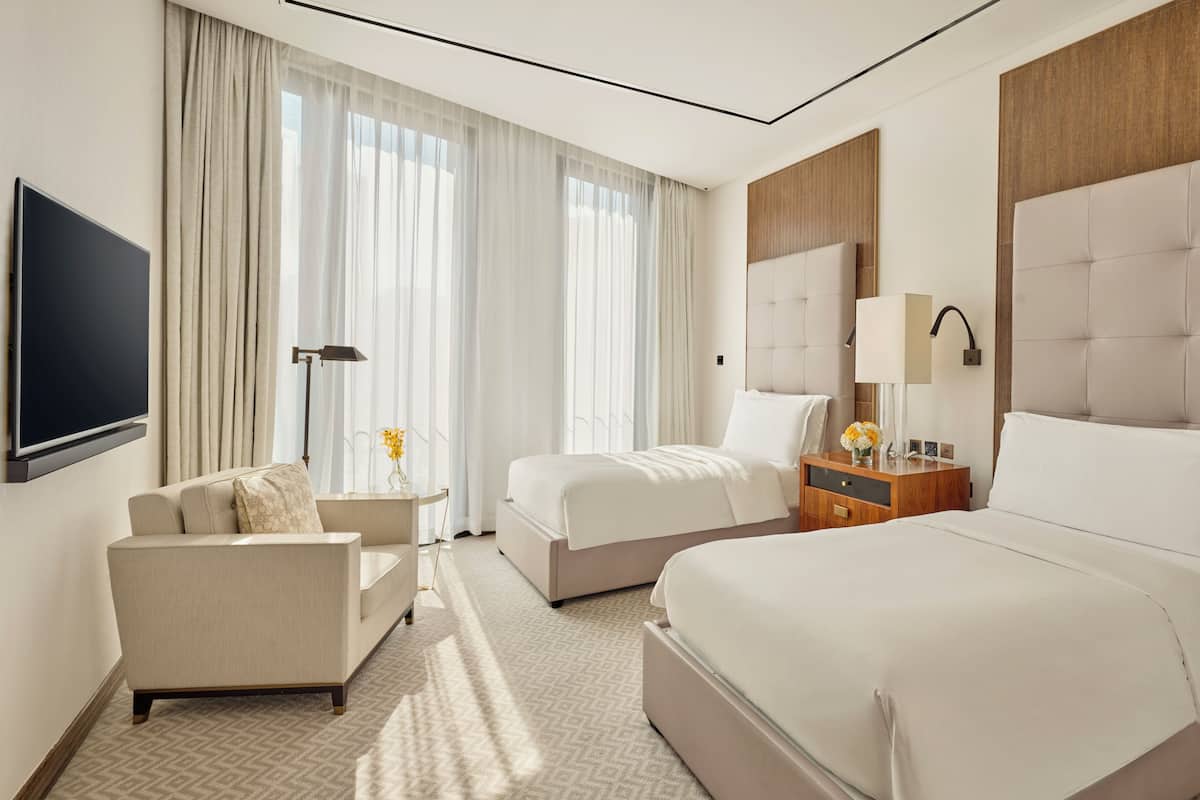 Apartamento, 4 habitaciones (Duplex 2King 1Queen 2Twin) | Ropa de cama de alta calidad, edredones de plumas, minibar y caja fuerte