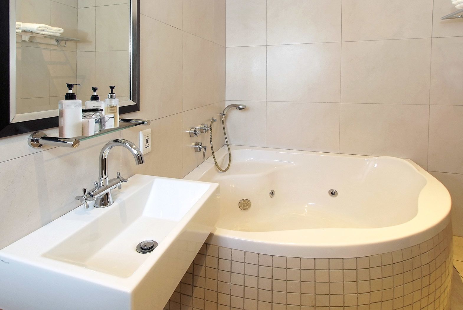 executive self-catering suite | bathroom | shower, hair dryer, bathrobes, slippers